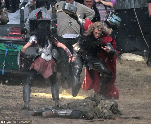 Wielding his hammer: The movie sequel is due for release in November 2013, and looks to be as action-packed as the first film