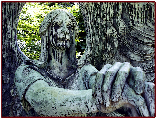 crying angel LVC. Angel on gravemarker at Lakeview Cemetery. Photo by: me