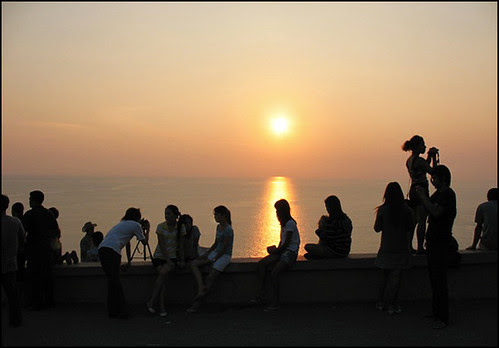  a rocky headland surrounded past times steep cliffs amongst views of the sea too all the islands t BangkokMap; Sunset at Cape Phromthep