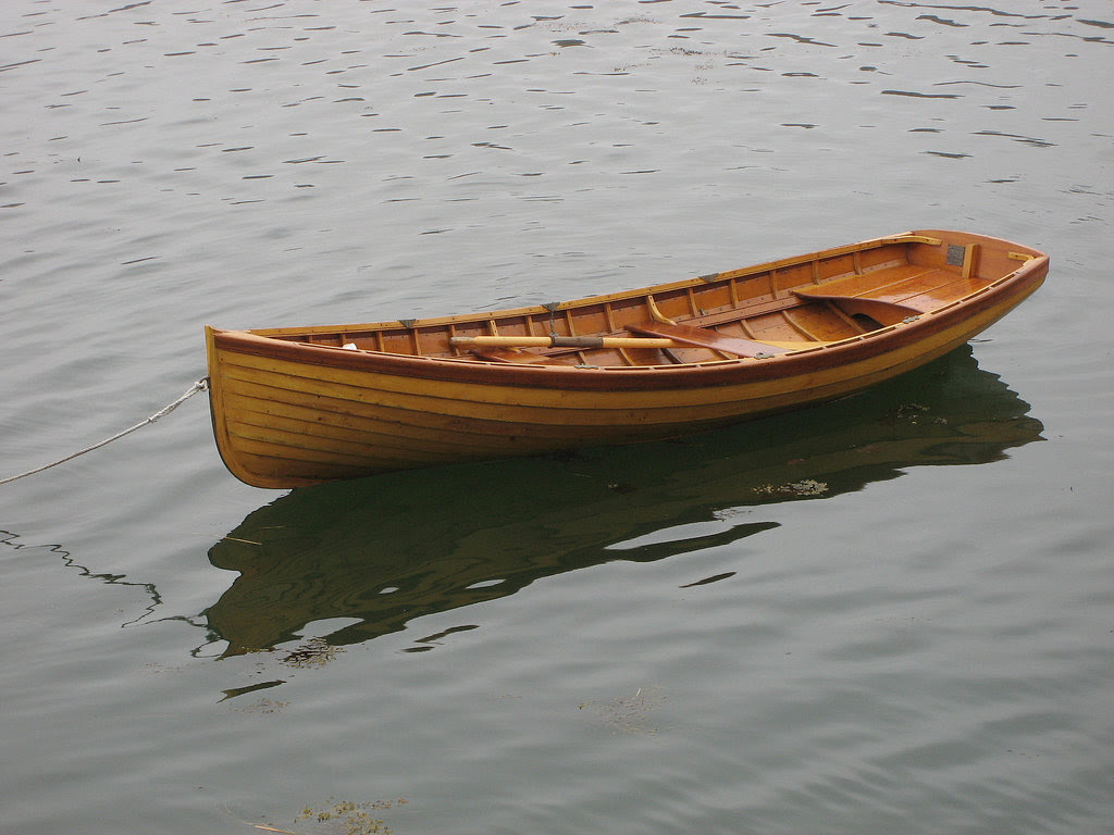 Rowing boat built from wood in the traditional way – and isn’t
