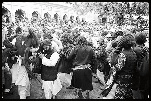 The Malangs Open Out Their Long Hair At The Holy Shrine of Zinda Shah Madar by firoze shakir photographerno1
