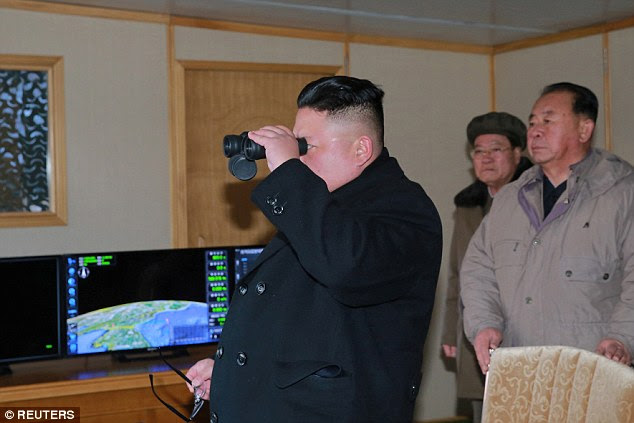 Kim Jong-Un ordered his military 'to keep highly alert as required by the grim situation in which an actual war may break out anytime.' Pictured: Kim Jong-Un guiding the test-fire of a missile in an undated photo