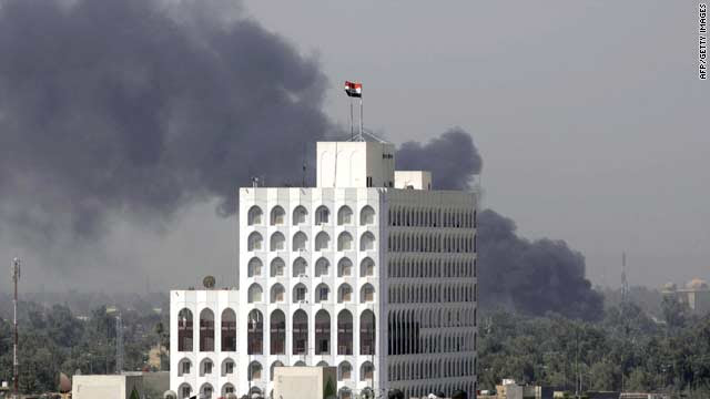 Smoke billows after a suicide car bomb targeted Al-Arabiya TV's office in central Baghdad on Monday.