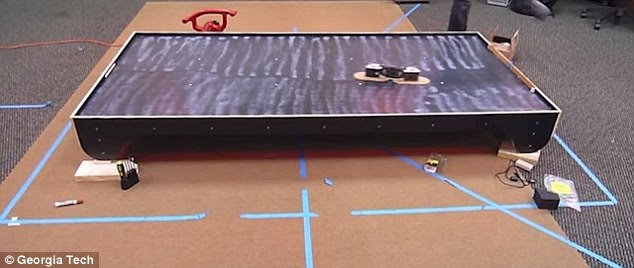 In their experiments with a small robot consisting of a main body and two symmetric legs with paddles, the team compensated for the fact that a robot cannot move fast enough in by creating a reduced-gravity environment using a tilted surface