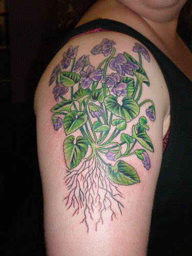 violet flower tattoo. Violets are the flower for
