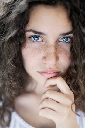 Capture The Beauty Of A Woman With Blue Eyes Photo