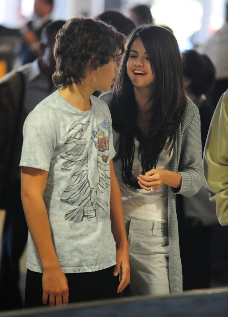 Selena Gomez And Co-Star Jake Austin Stay Close At LAX