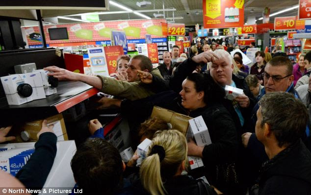 Grab: Crowds of bargain hunters waited outside the store from around 6am - with the event starting at 8am