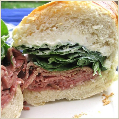 Salami, Pastrami, Spinach, and Cream Cheese Sandwich