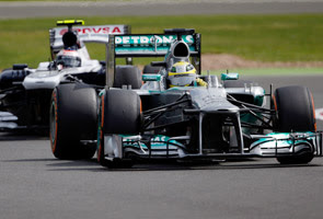 Rosberg triumphs in incident-packed British GP