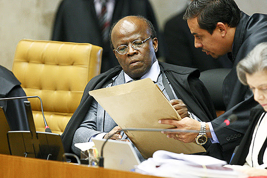 O ministro e presidente do STF, Joaquim Barbosa, relator do julgamento do mensalão