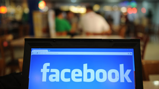 TO GO WITH Philippines-Internet-rights-law,lead-FOCUS by Cecil Morella
(FILES) In a file picture taken on May 15, 2012, a logo of social networking fa...