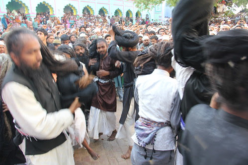 The Malangs Open Out Their Long Hair At The Holy Shrine of Zinda Shah Madar by firoze shakir photographerno1