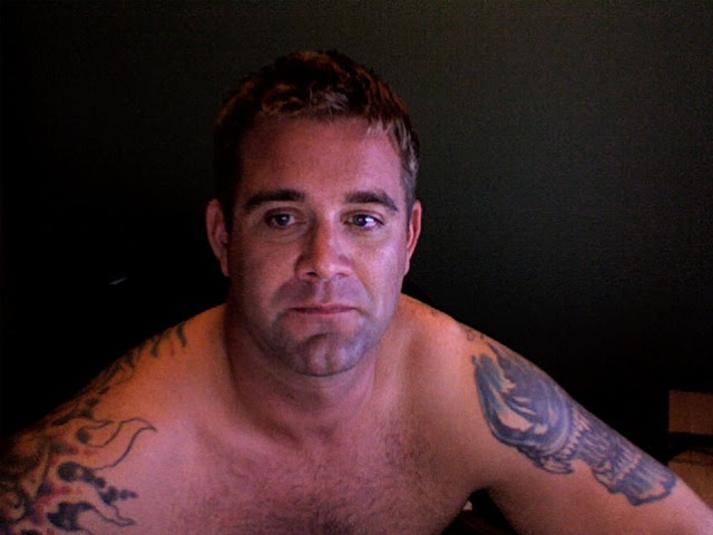 computer and decided to take pictures of himself and his ugly tattoos,