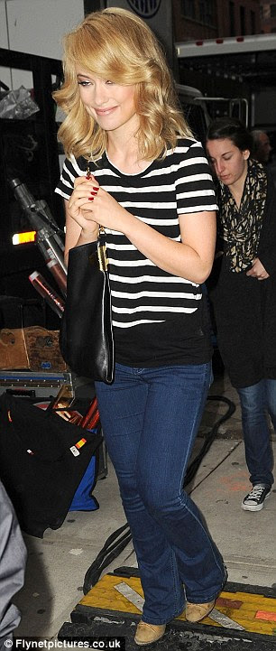 Job done: She was seen wearing Ugg boots between takes, before changing into her casual clothes after the shoot
