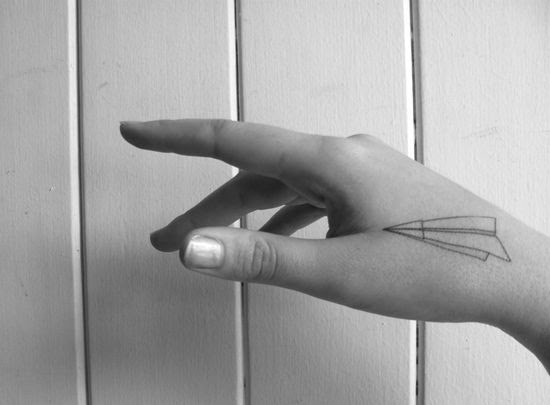 Love: paper airplane temporary tattoo.