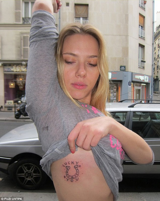 Scarlett Johansson adds to her tattoo collection with a ...