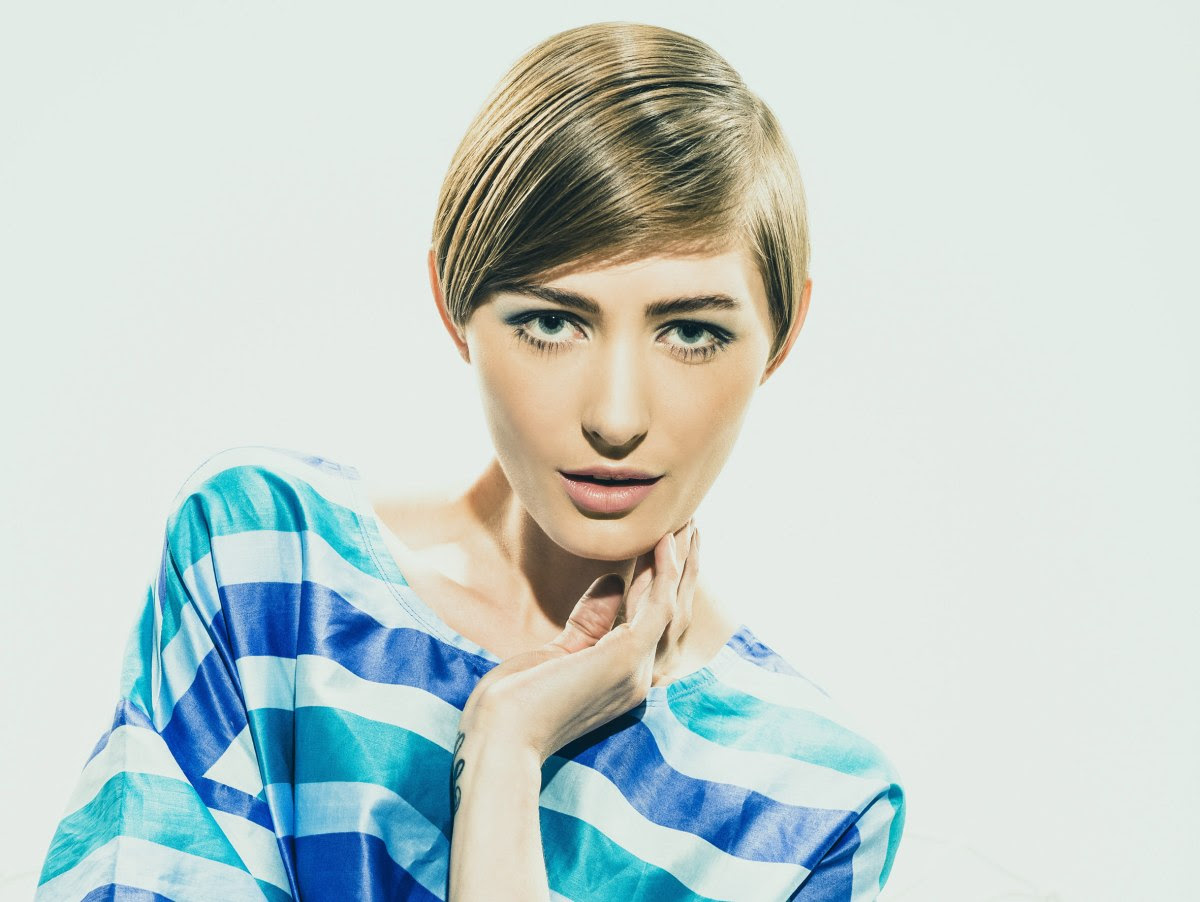 Sleek short hairstyle with gel styling