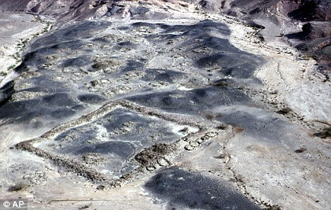 Ancient: The outline of a large square fortress and more than 100 smaller buildings at Khirbat en-Nahas. The black slag indicates large-scale copper production occurred here