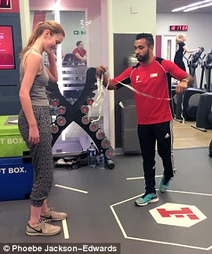Personal trainer Jubaer has a tape-measure ready for Phoebe's standing jump
