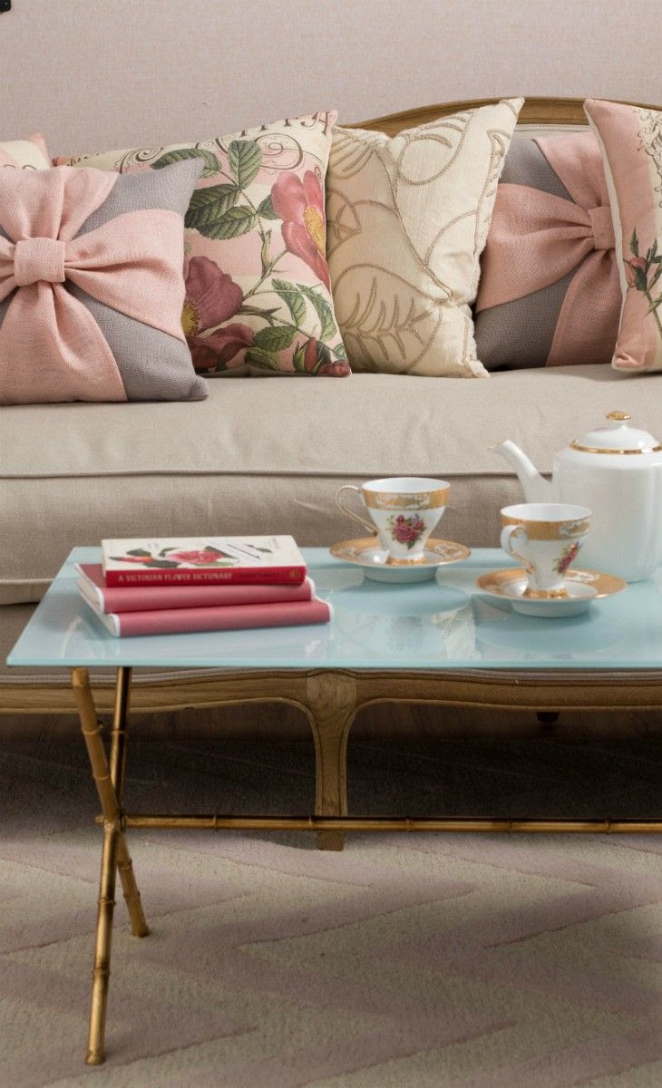 See how wrong my life is? I love this.   Rose and Gold Pillows-  Love that Coffee table!