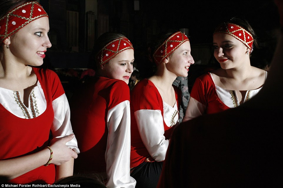 Opportunities: Children wait back stage at a theatre in Slavutych, just outside the exclusion zone, for a recital of a performance they first put on in Kiev. With the fear of radiation subsiding, those living around Chernobyl are becoming concerned for their future, and that of the young