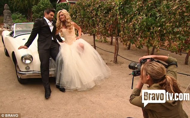 Test run: The blonde and her fiance Eddie Judge posed for a wedding themed shoot