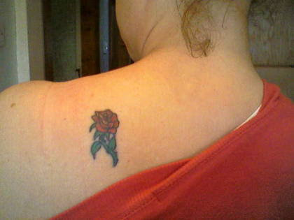 Rose tattoo on the shoulder of Suzanne in Birmingham