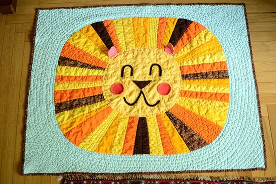 Cute lion baby quilt
