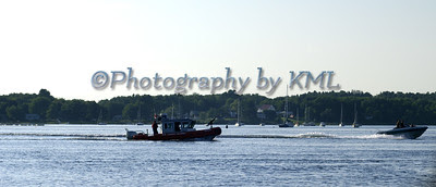 marine patrol in the bay chasing a boat