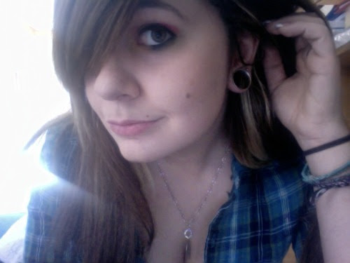 Not shown: Tongue and nipples pierced, septum.