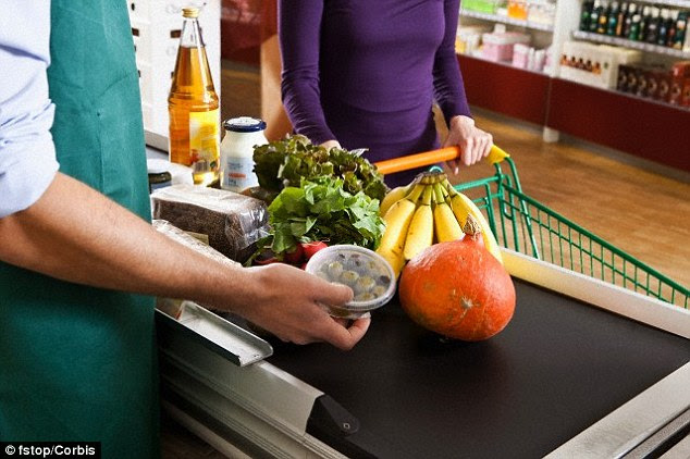 Zapp will be integrated into a mobile banking application. Bank customers will be able to see their balances on each account, and choose which one to pay from. When customers reach the checkout of a shop (stock image) that accepts Zapp payments, they will have a special code sent to their mobile phone