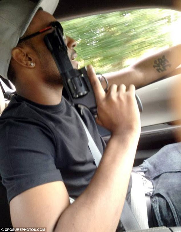 Bobbi Kristina's boyfriend tweets pic of himself brandishing a gun???