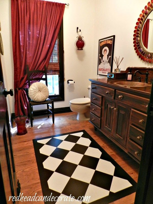 Take my home tour (redheadcandecorate.com), or just come check out this cool rug I painted on the floor.  It was easier than you would think, and it's holding up. ~ Julie