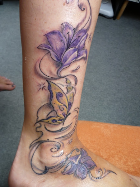 tattoo oberarm außen frau