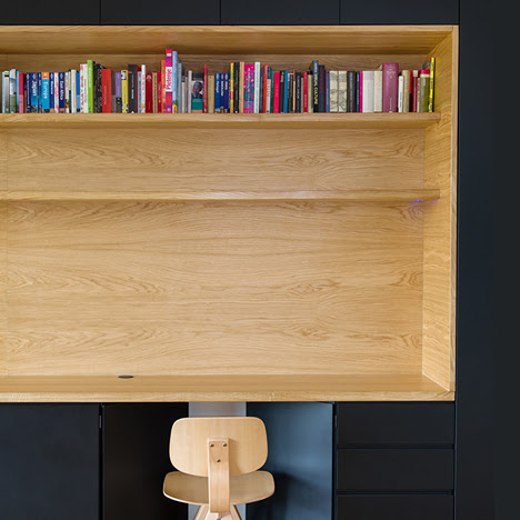 Wooden niches contain work surfaces and storage inside Wooden niches contain work surfaces and storage inside