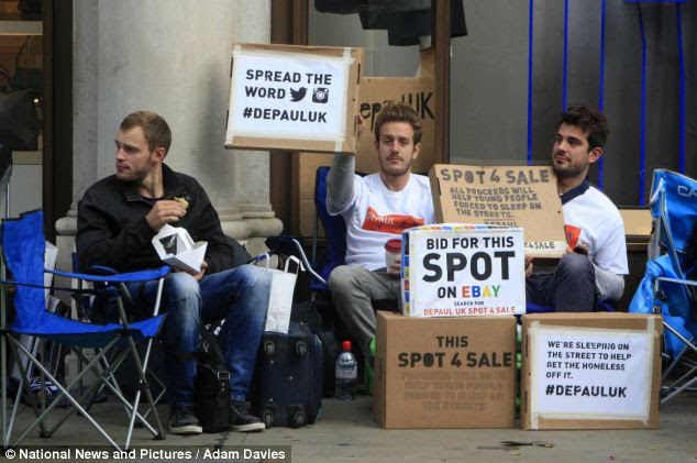 Cash in hand: Fans queue outside the Apple Store with two looking to sell their spot on eBay in a bidding war. One place in New York has already been sold for $2,500 (£1,500)