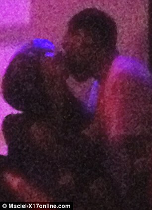 Just friends: The pair looked cosy throughout the evening but Nicole insists they were simply trying to chat over the loud music
