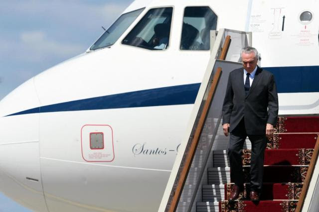 Janot pede multa de R$ 10 milhões de Michel Temer e R$ 2 milhões de Rocha Loures Kirill KUDRYAVTSEV/AFP