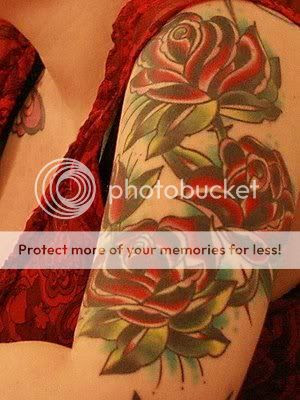 red rose arm tattoo