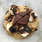 [homemade] chocolate chunk cannabutter cookie with crushed graham crackers & toasted marshmallows