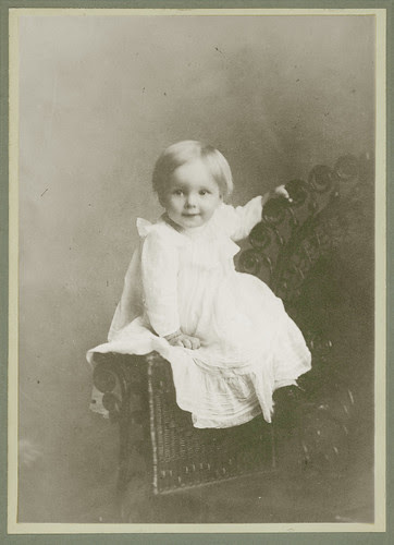 Child on a One Arm Chair