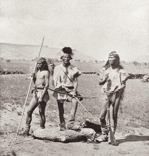 Wheeler Survey ApachesOne of the pioneer photographers of Southwestern Indians, Timothy H. O’Sullivan traveled with Lt. George M. Wheeler’s survey west of the 100th Meridian during 1871-74. After some boats capsized, few of his 300 negatives survived the trip back East. This one, of “Apaches Indians, as they appear ready for the war-path,” made it.– Courtesy Library of Congress –