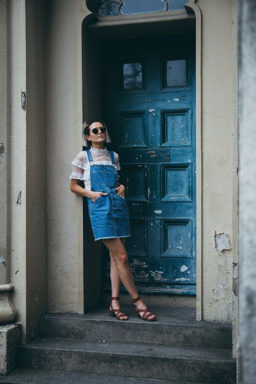 Le Fashion Blog Denim Overall Dress Girly Shirt Sandals Via Chloe Helen Miles 