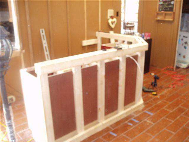 Here is what it looks like from behind the bar with frig in place