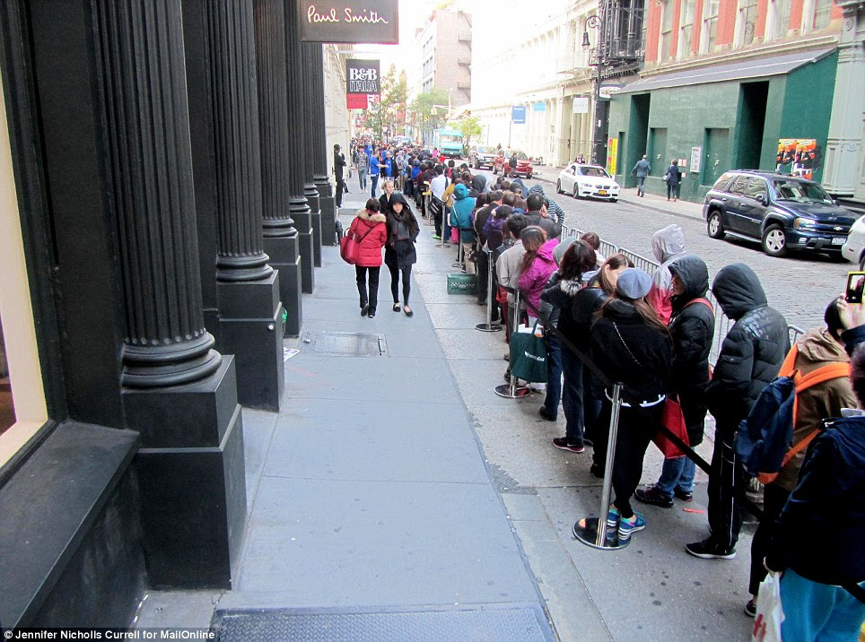 The left-hand lane of this cordoned off section outside the Apple Store in Soho, New York was reserved for staff, people who pre-ordered the device and those who had already bought one. The right-hand lane was used for fans who were still queuing