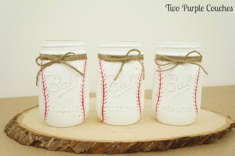 Create your own painted baseball mason jars with this easy-to-follow tutorial! These make adorable utensil caddies or vases for a baseball themed baby shower or party! 