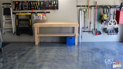 Dressing up the concrete floor with colorful epox. DIY Garage Floor Makeover with RockSolid Metallic Floor