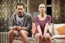 In this image released by Polk PR, Thomas Sadoski, left, and Amanda Seyfried appear during a performance of Neil LaBute’s new play, "The Way We Get By", in New York. (Joan Marcus/ Polk PR via AP)