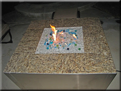 glass table topper. The fire pit table below is